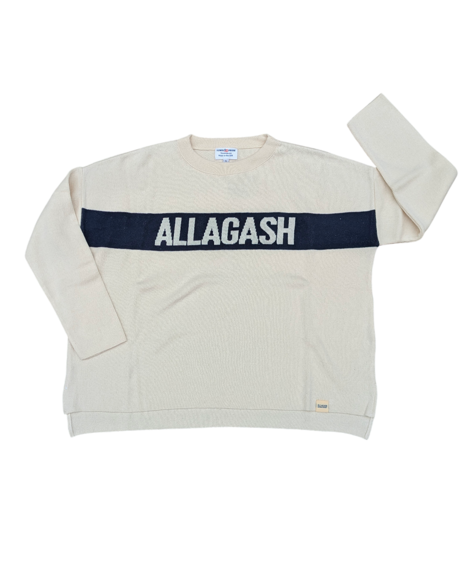 an off white sweater with a navy stipe that reads Allagash