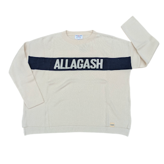 an off white sweater with a navy stipe that reads Allagash
