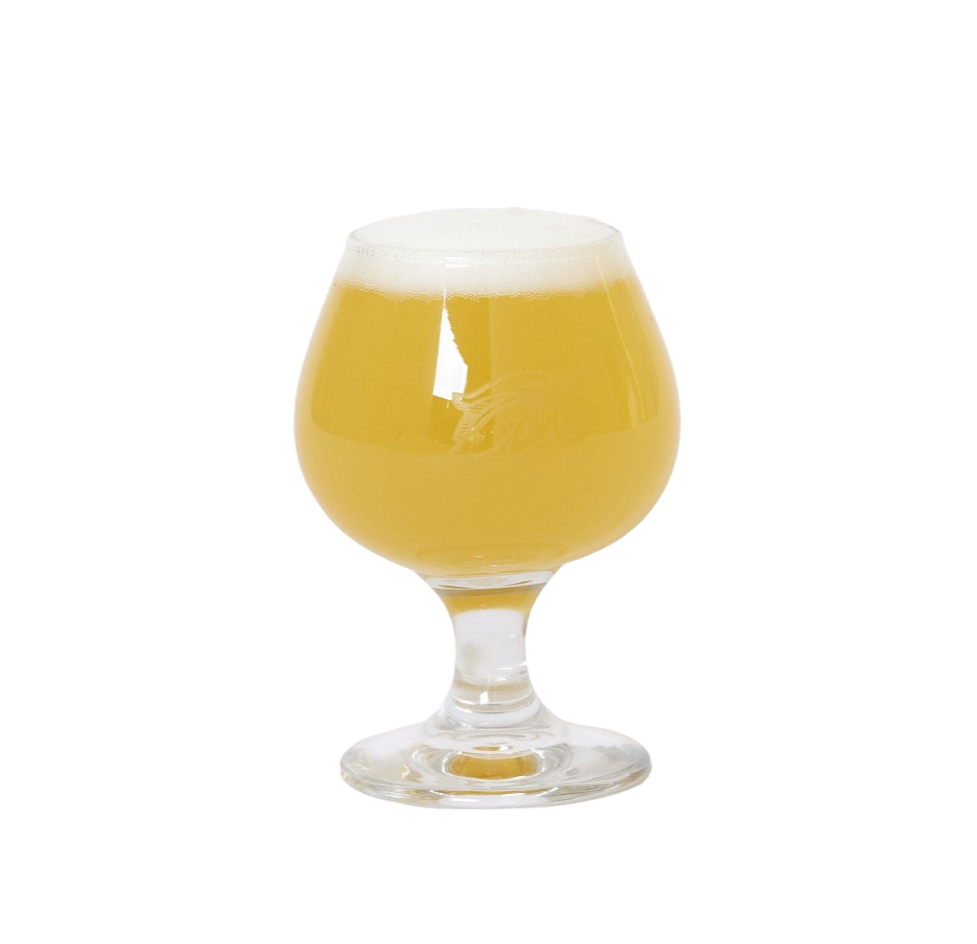 A full, small glass with a laser etched leaf on the front.