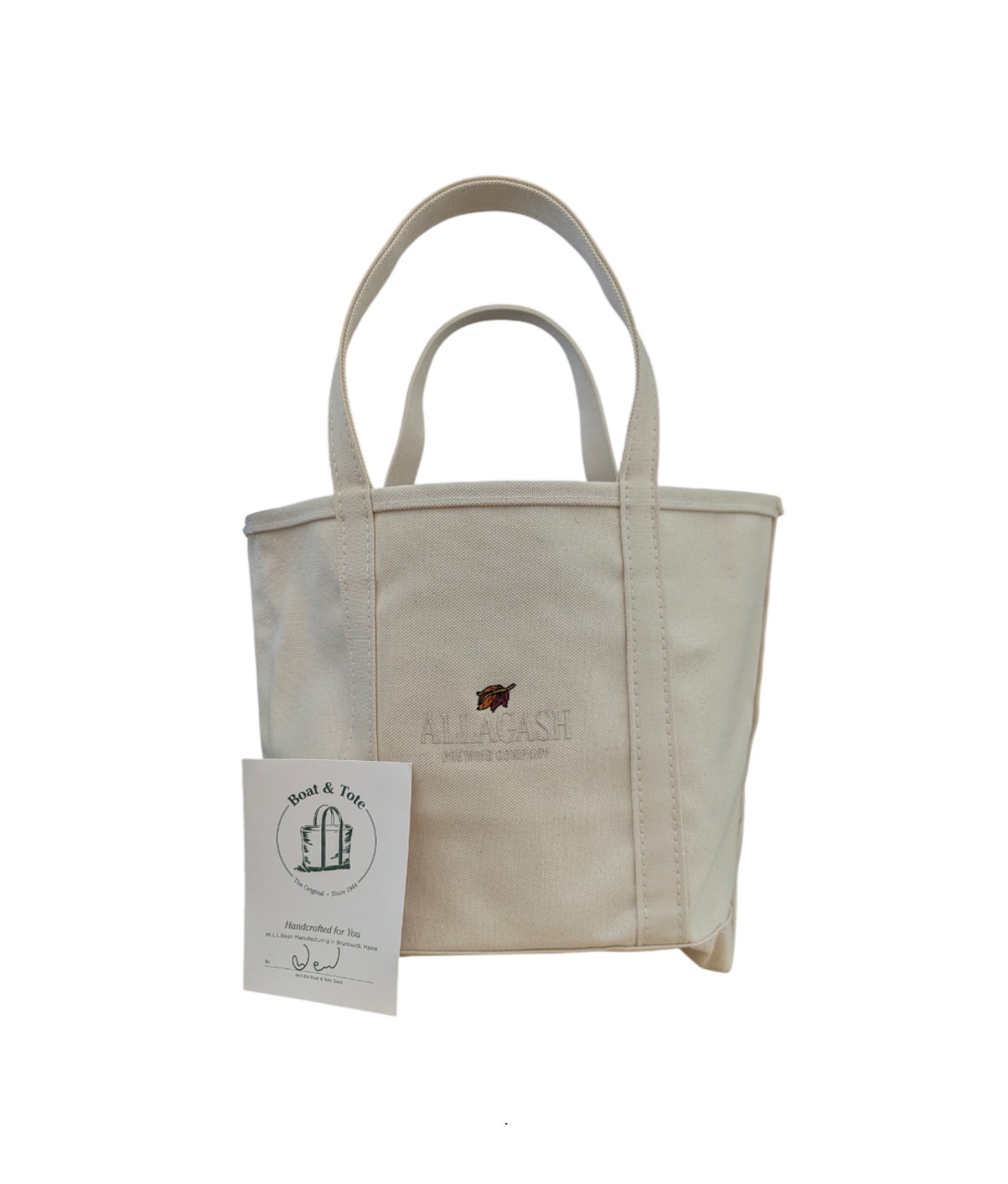 A white totebag with a multicolor Allagash leaf and the text "Allagash Brewing Company"