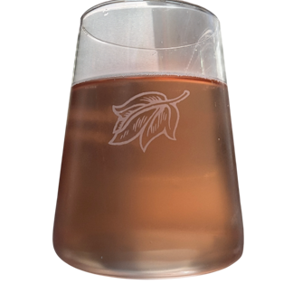 A stemless glass with leaf etching