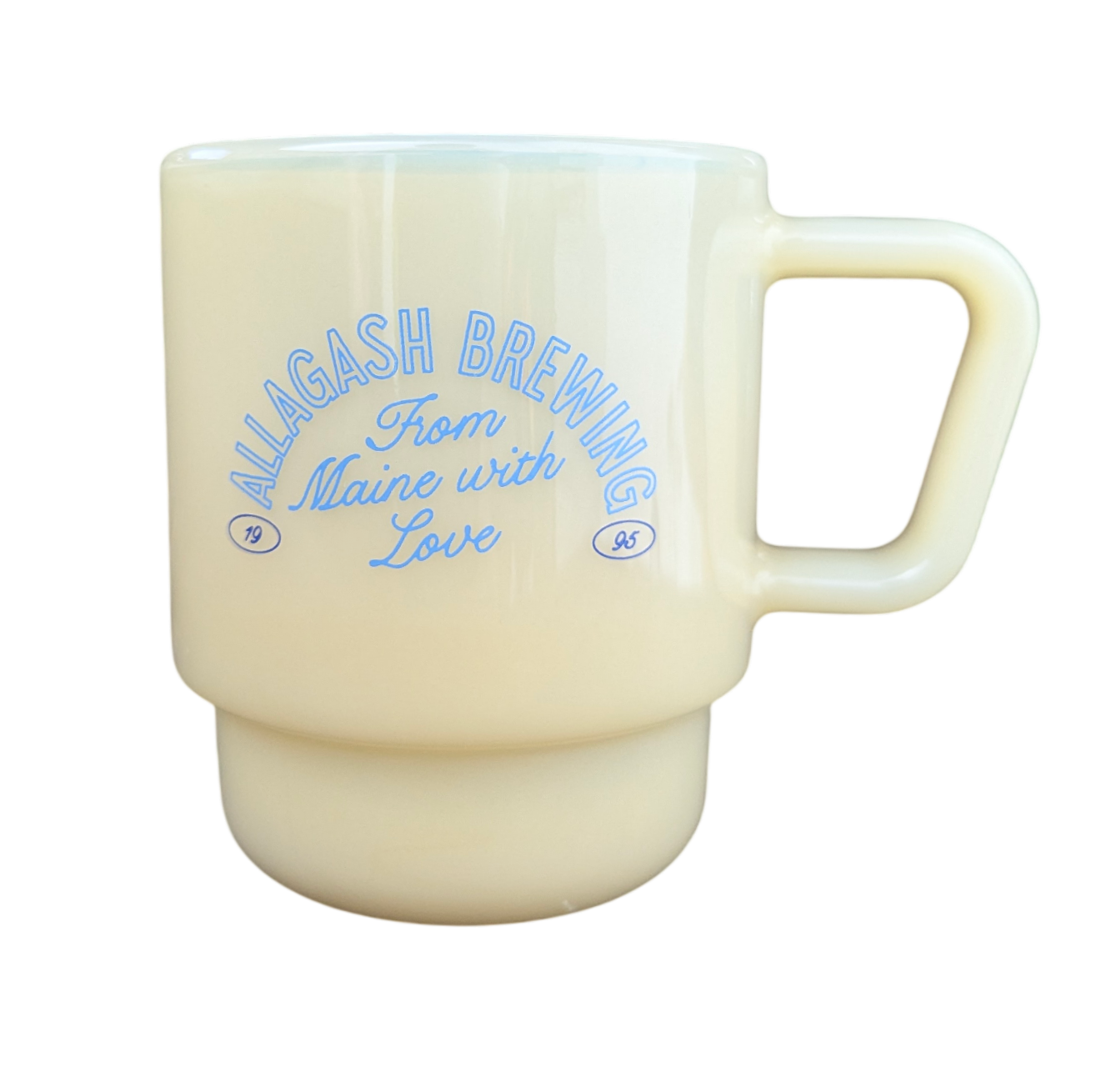 a yellow mug with light blue text reading Allagash Brewing From Maine, With Love