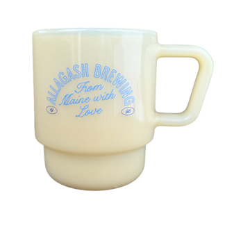 a yellow mug with light blue text reading Allagash Brewing From Maine, With Love