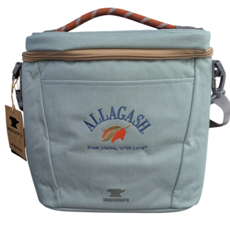 a blue cooler with red accents and a logo that reads Allagash