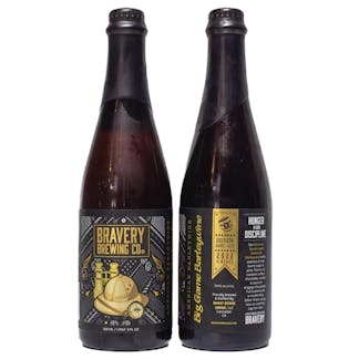 two bottles of Big Game Barleywine bourbon barrel-aged beer, the left bottle showing the front label art, the right showing the label details