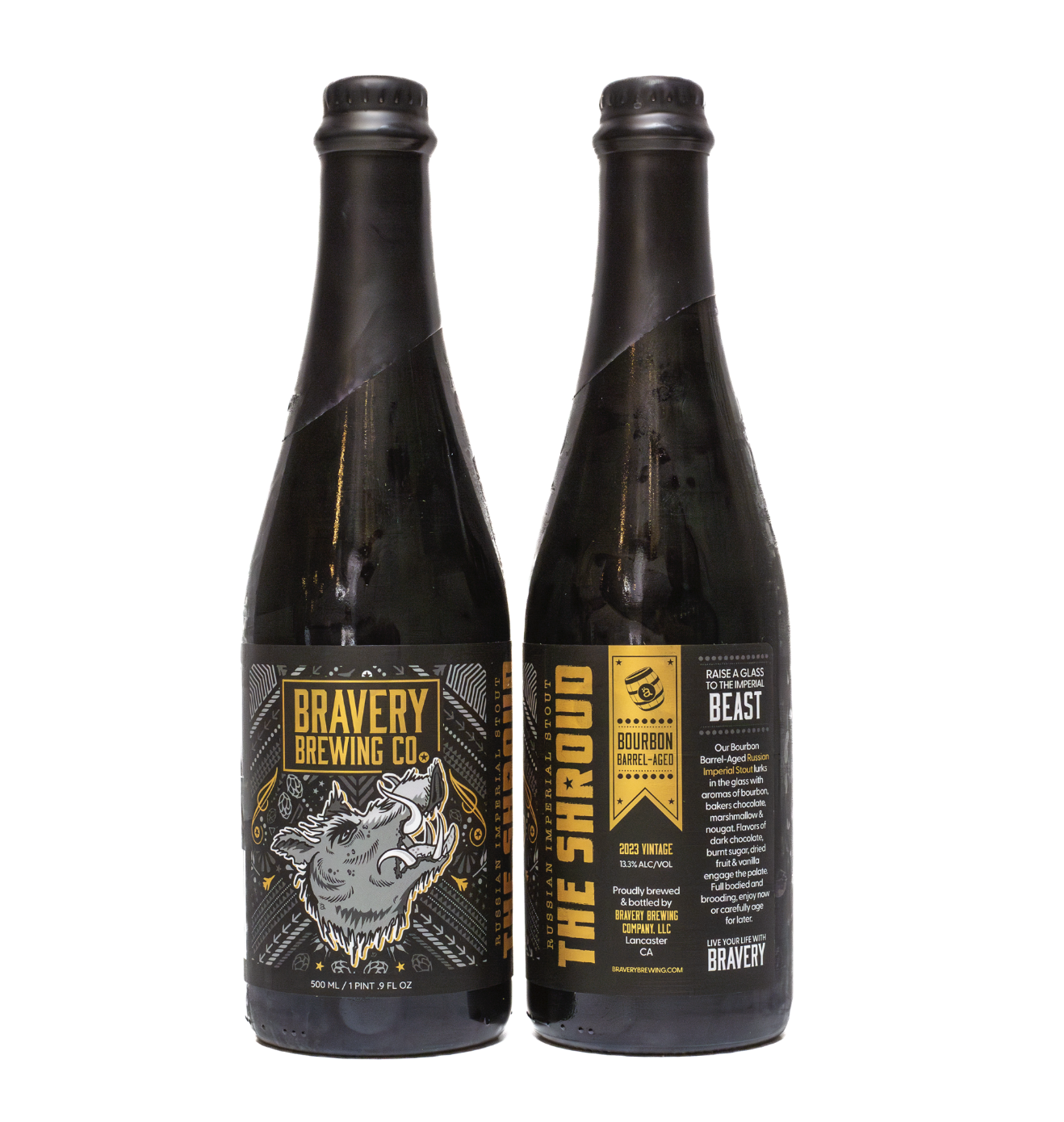 two bottles of The Shroud bourbon barrel-aged beer, the left bottle showing the front label art, the right showing the label details