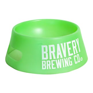 front of glow green Dog Bowl with Bravery's logo printed large in white
