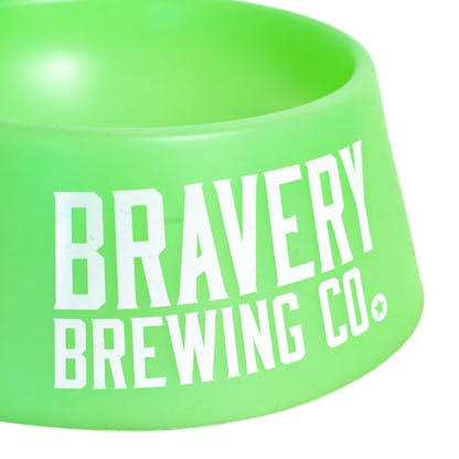front detail of glow green Dog Bowl with Bravery's logo printed large in white
