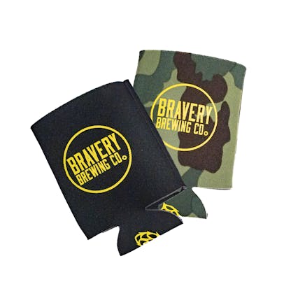 a black beer koozie laying on top of a camo beer koozie. both koozies have Bravery's Logo within a circle printed in yellow, along with a beer hop printed in yellow on the bottom.