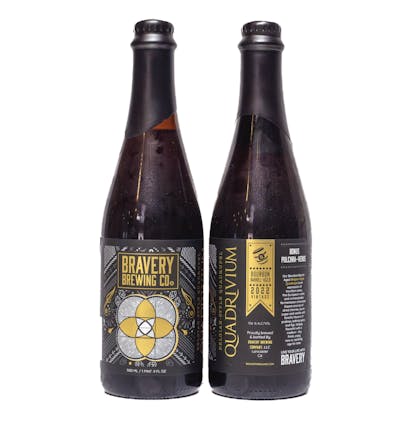 two bottles of Quadrivium bourbon barrel-aged beer, the left bottle showing the front label art, the right showing the label details