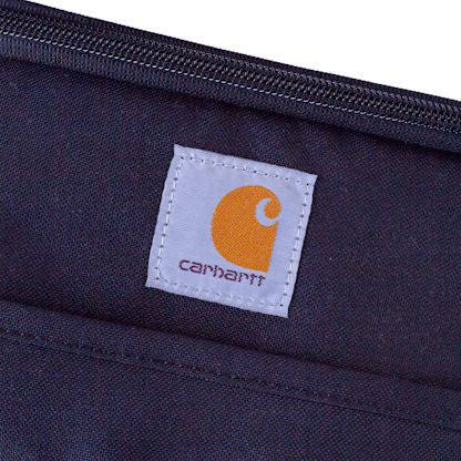 Detail photo showing the Carhartt logo patch sewn on the front of the cooler.