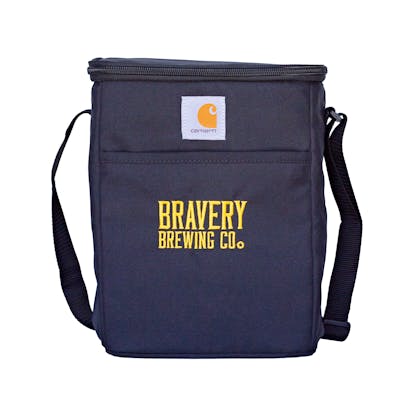 Photo of the Carhartt cooler from the front. The cooler is black with a carhartt logo patch sewn on the front along with the text "Bravery Brewing Co." embroidered in yellow. There is a long black strap attached to either side of the top.