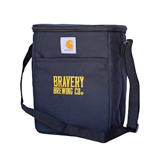 Photo of the Carhartt cooler from an angle. The cooler is black with a carhartt logo patch sewn on the front along with the text "Bravery Brewing Co." embroidered in yellow. There is a long black strap attached to either side of the top.