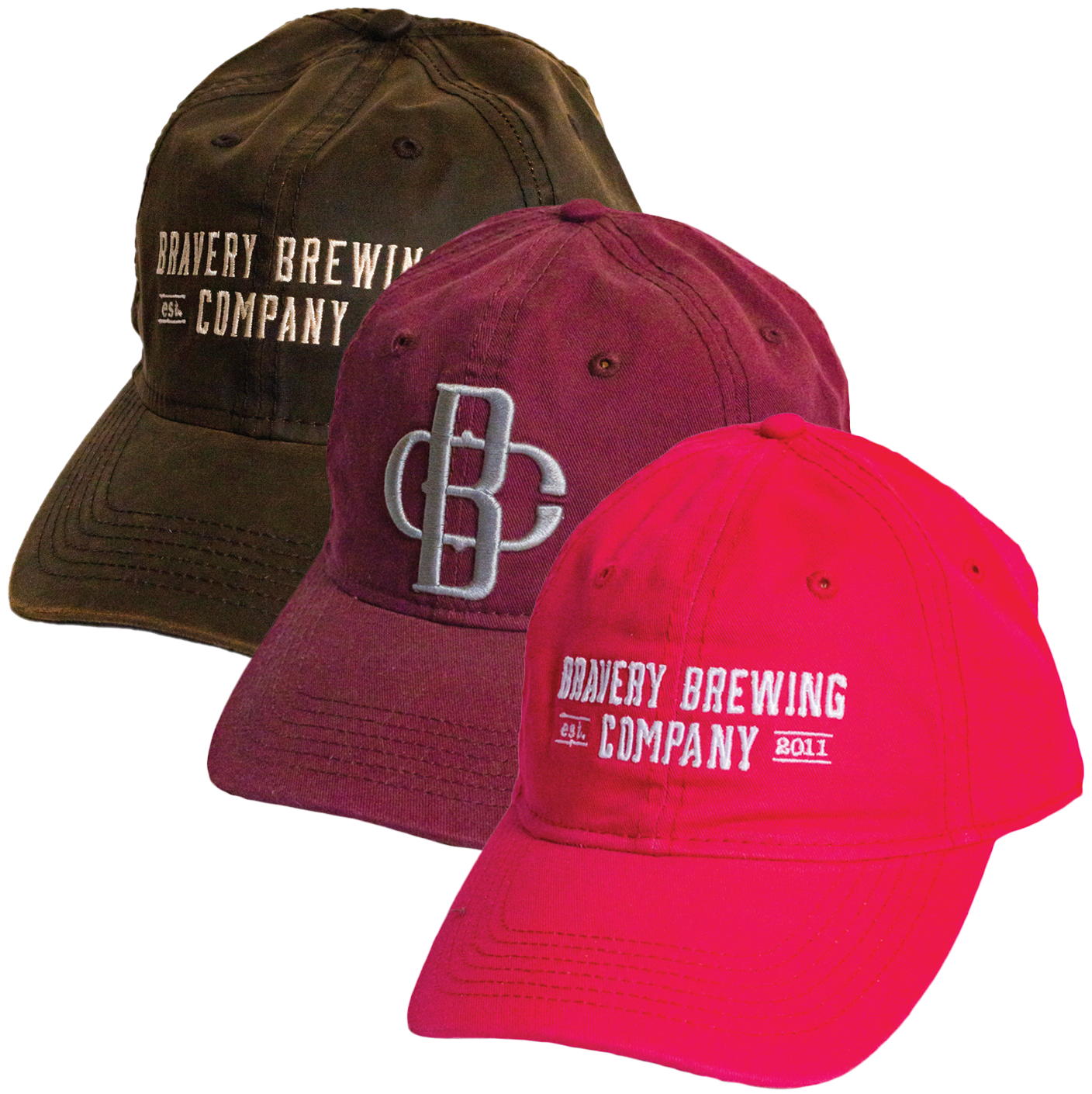 Photo of three dad hats on a white background. From left to right the hats are brown, maroon and bright pick in color.