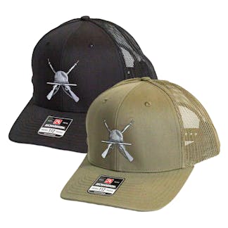 Photo showing the Gunny baseball cap in green and black side by side on a white background.