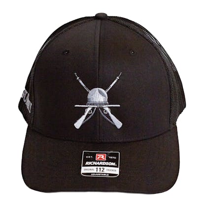 Front photo of Black trucker cap on a white background. The hat has black fabric for the front two panels and bill with black mesh for the back four panels. There is a white and grey embroidered art for the beer "The Gunny" across the front two panels.