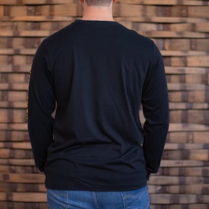 Photo of a person wearing a black long sleeve shirt from behind, the shirt back is blank.
